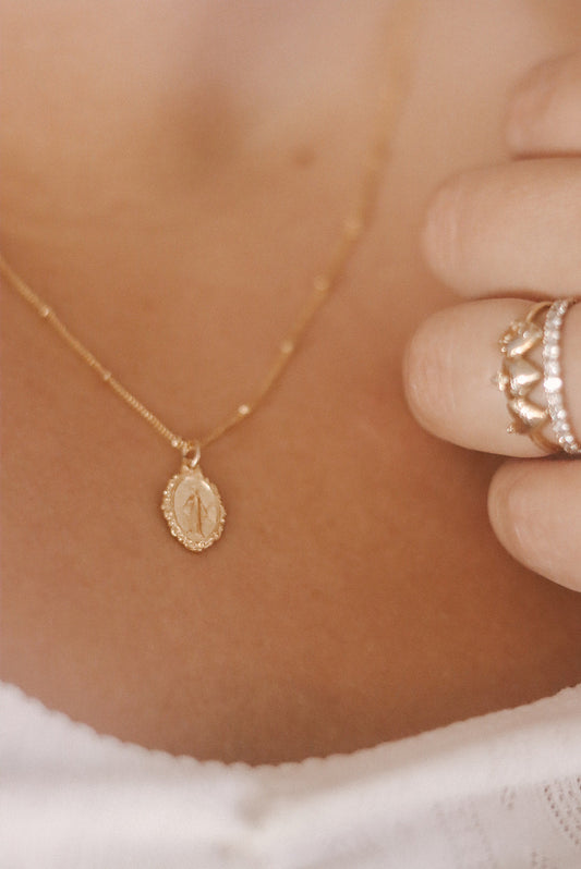 Intricate Miraculous medal necklace